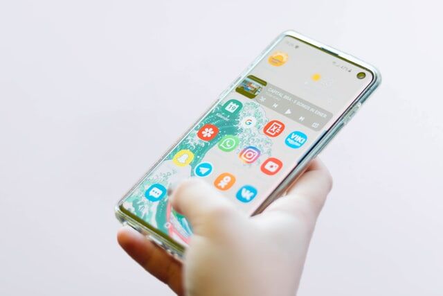 holding mobile phone
